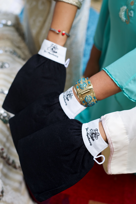 Three different models’ hands are inside three Kessa gloves